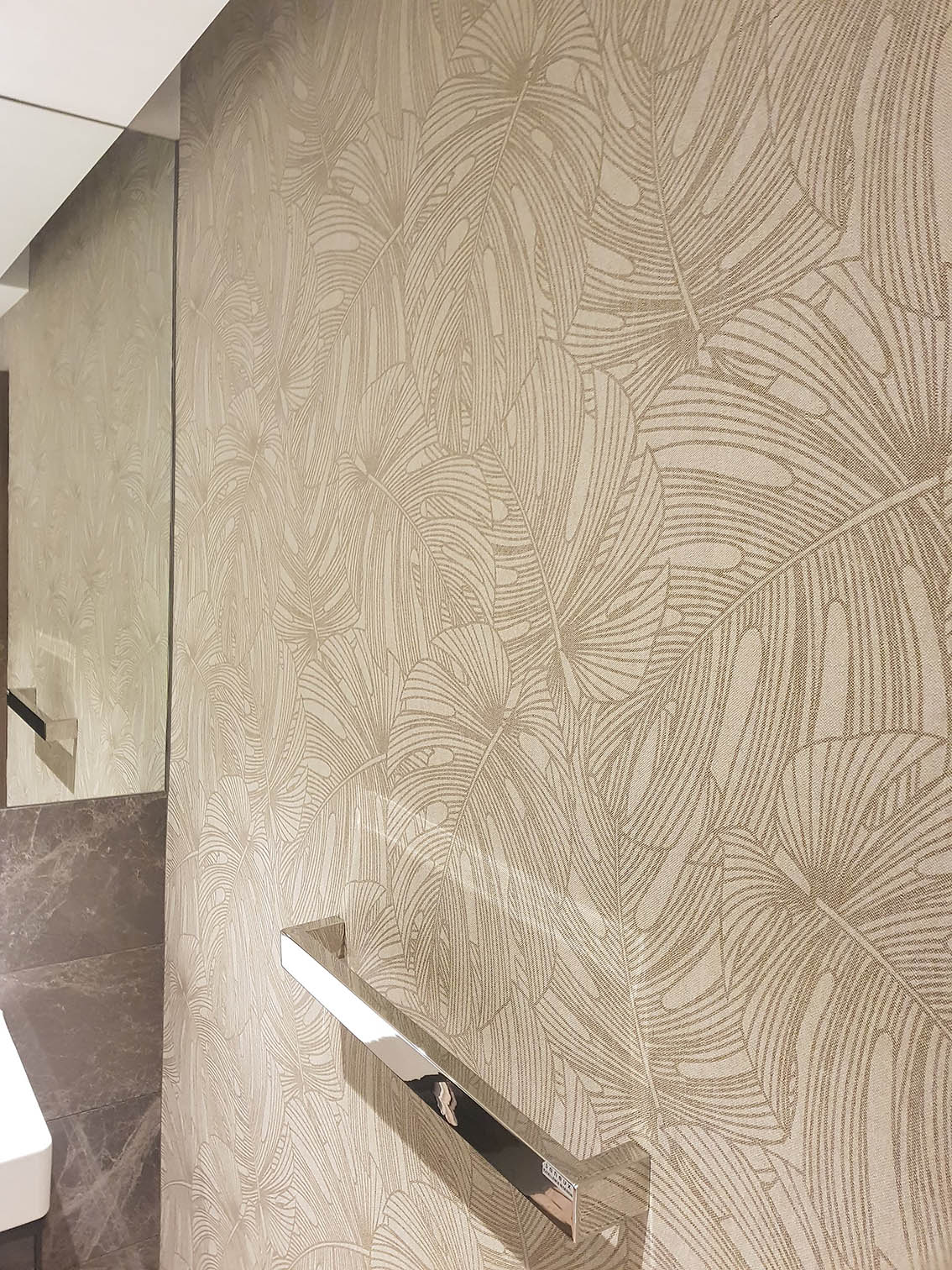 Arte Flamant wallpaper installed in a bathroom.