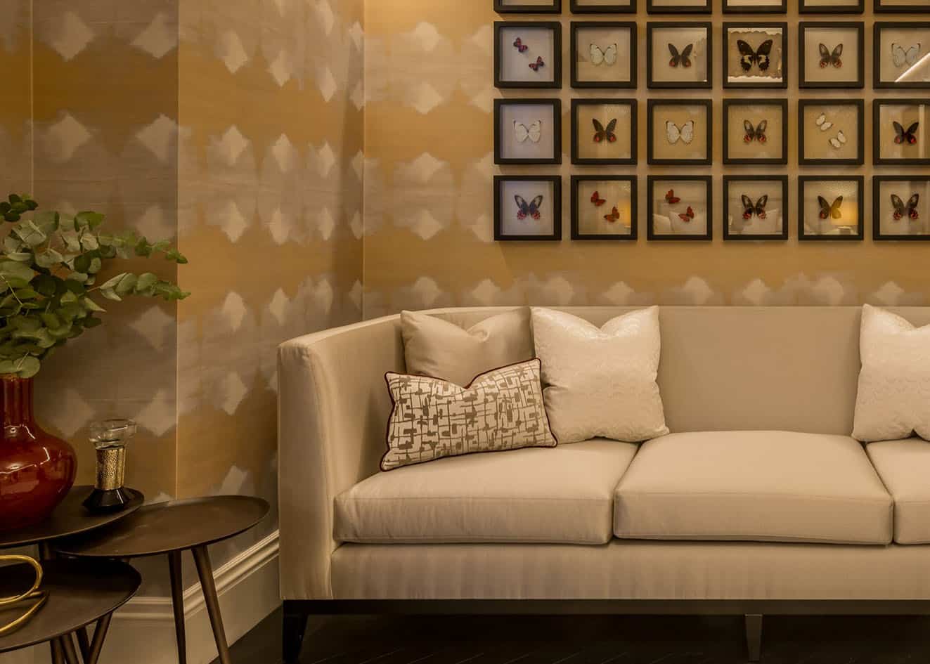 Yellow patterned wallpaper installation.