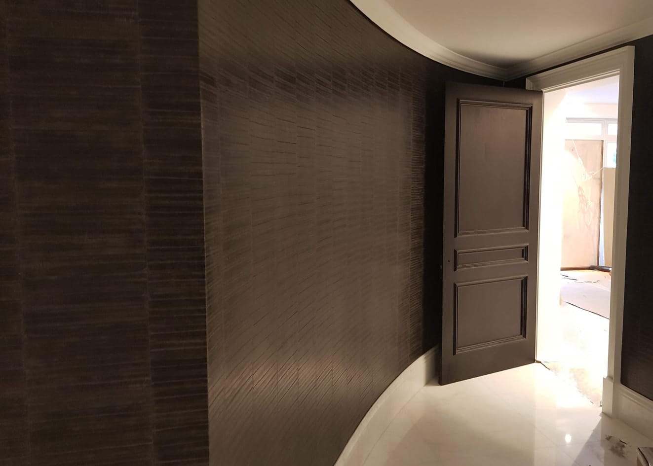 Elitis Eel Skin wallpaper installed by Bluespec Decorating wallpaper specialists in a hallway.