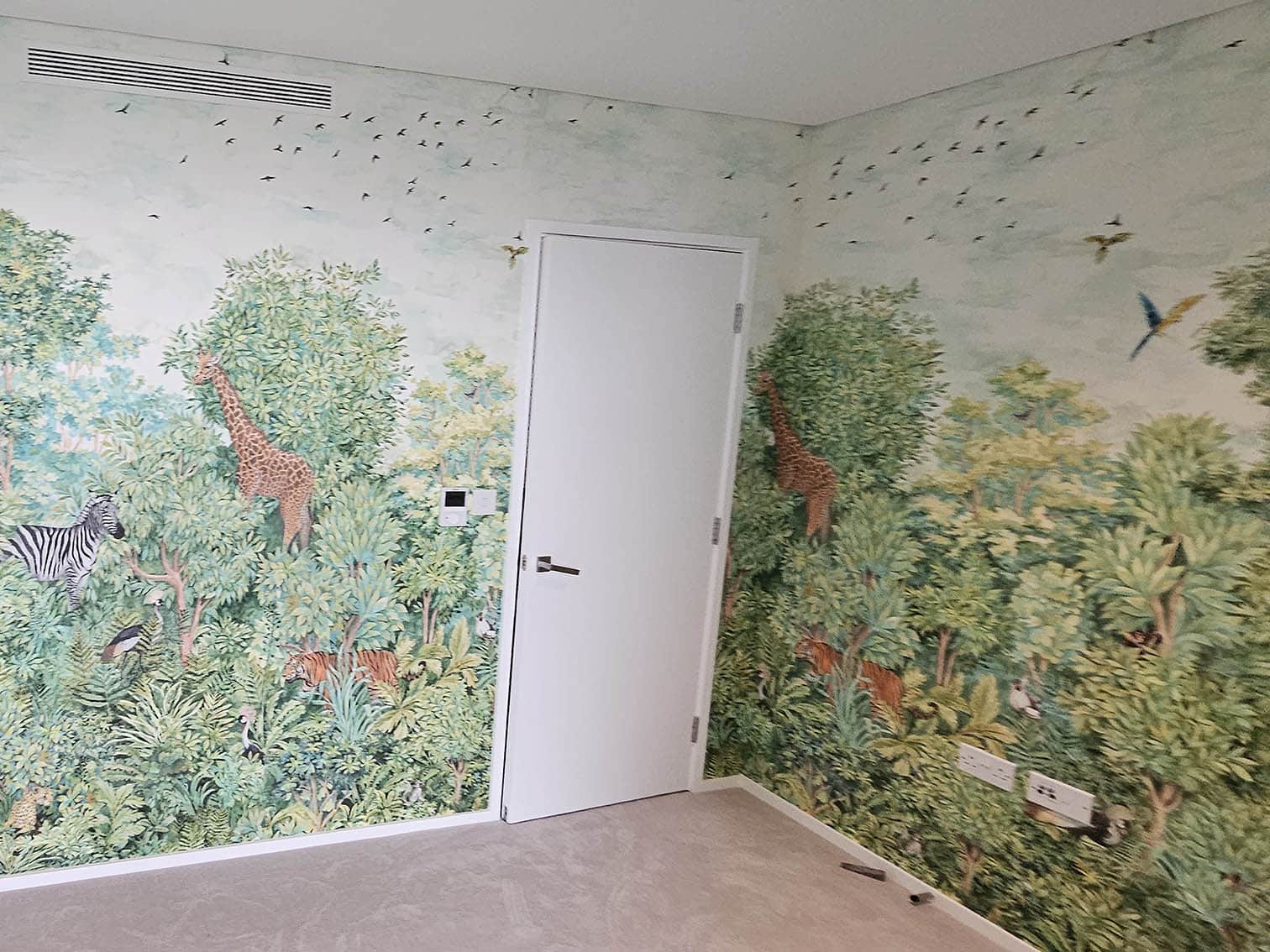 Animals and trees wallpaper installation.