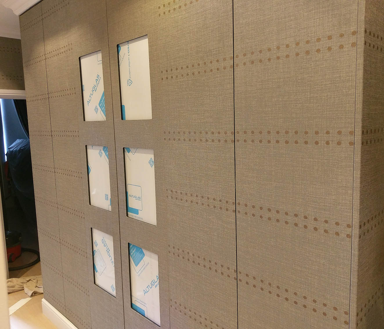 Creative idea- Phillip Jeffries wallpaper installed on wallpaper doors.