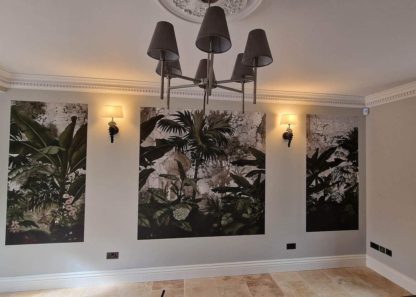 Ananbo wallpaper installation by Bluespec Decorating Limited installed in 3 panels to be framed. The wallpaper is in black and white palm trees and banana trees.