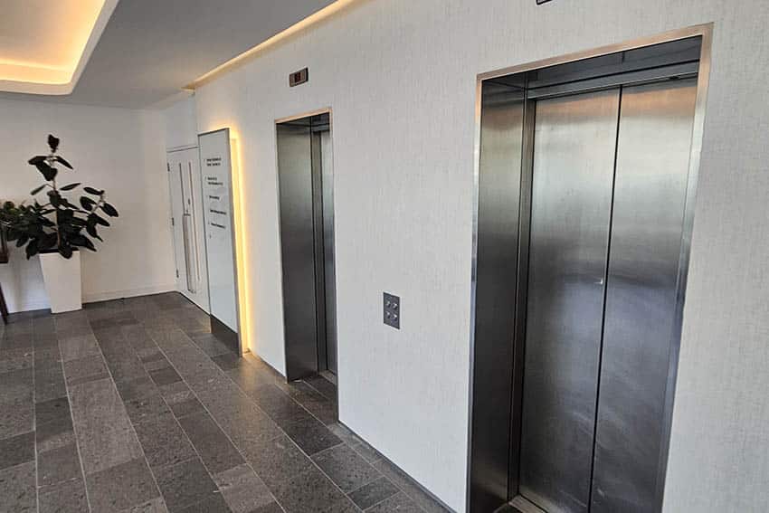 Arte wallpaper installed in Belgravia lift lobby by Bluespec wallpaper hangers.