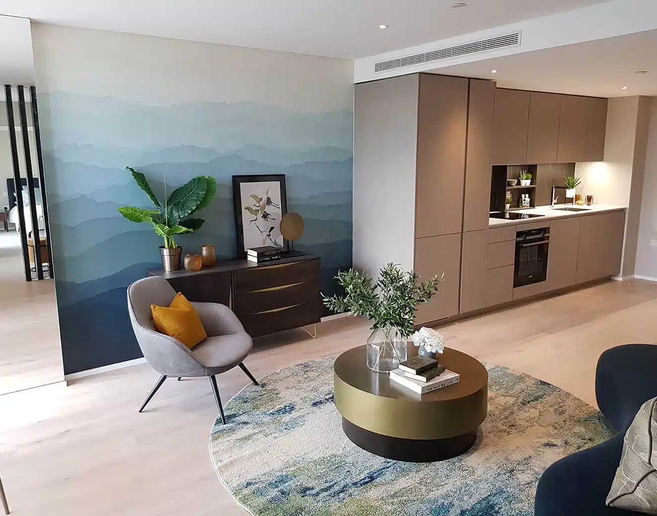 Wrey by zoffany wall mural installation in a show flat living room in London.
