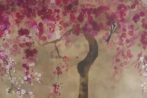 Designers Guild Shinsha wall mural installation by our wallpaper hangers A beautiful tree with dark pink flowers on a light brown background. There is a bird on the tree. The wall mural is a watercolour illustration.