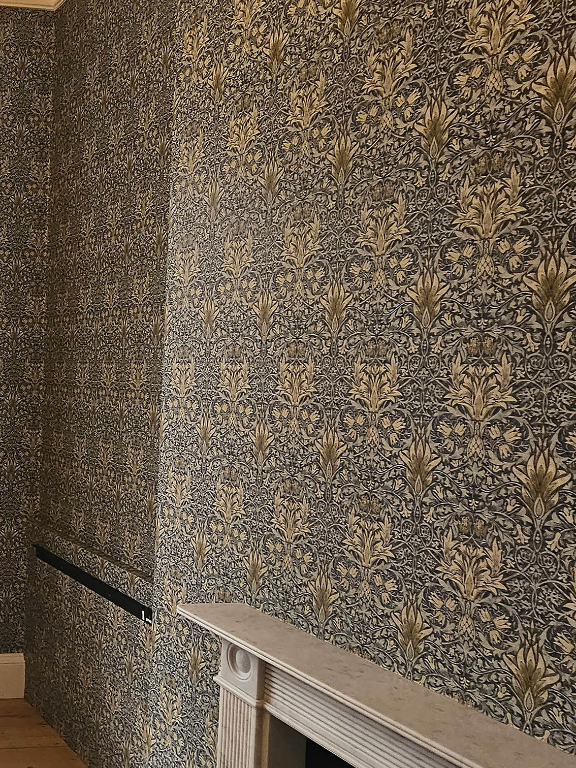 Vintage design wallpaper installed by our wallpaper installers.