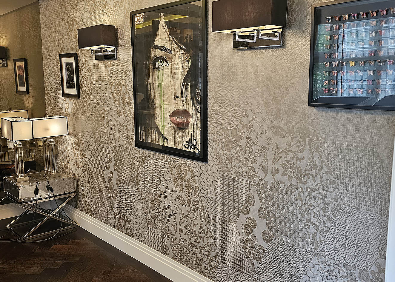 Arte Revera wallpaper with patch effect and gold foil hanging by Bluespec Decorating wallpaper hangers.