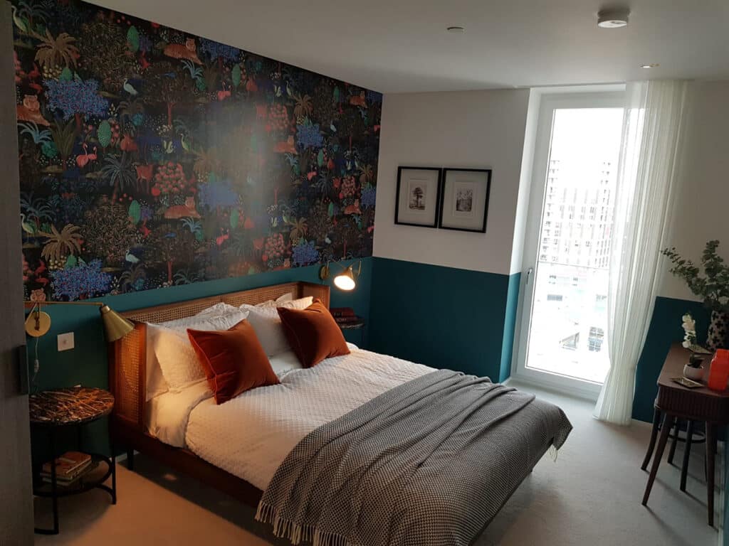 Pierre Frey wallpaper installed in a bedroom.