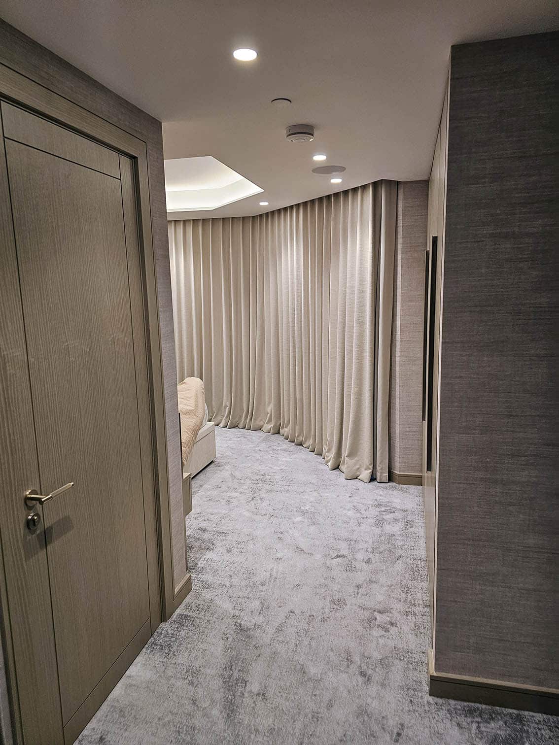 Specialist wallpaper hangers install Arte textured wallpaper Swiss Cottage London flat
