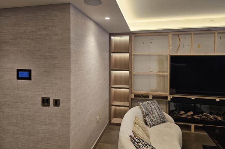 Arte wallpaper installation living room Swiss Cottage - professional wallpaper hangers London white sofa