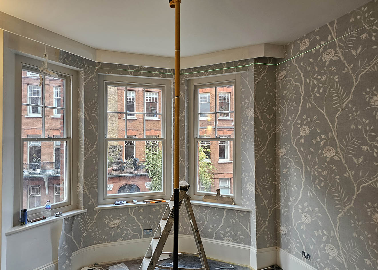 wallpapering=w11-london Wallpaper hanging , work in a progress photo. Chinoiserie wallpaper being installed next to a bay window in Notting Hill, W11.