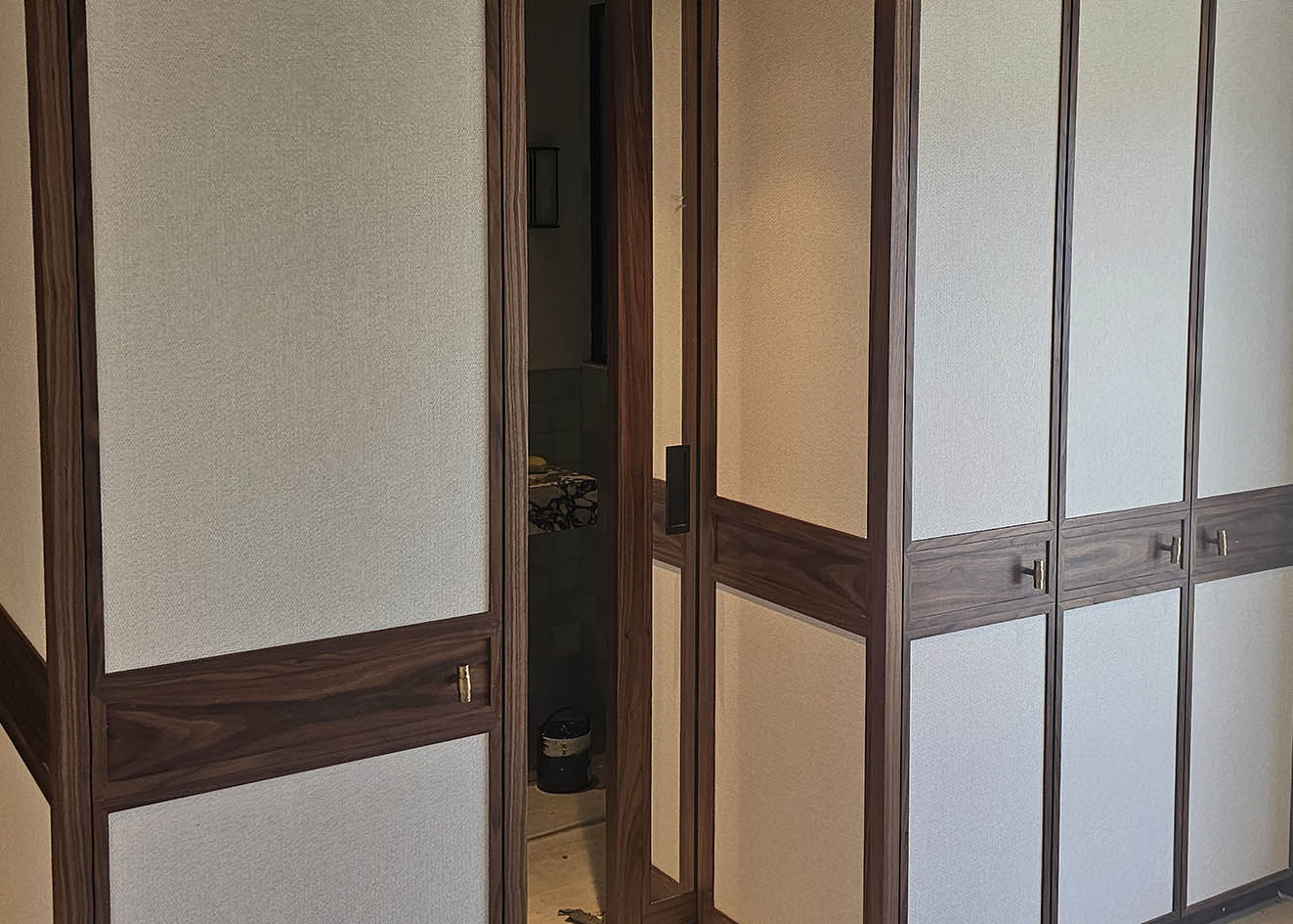 framed-paper-weave-wallcovering-installation-London Luxury paper weaved wallcovering installed in frames.