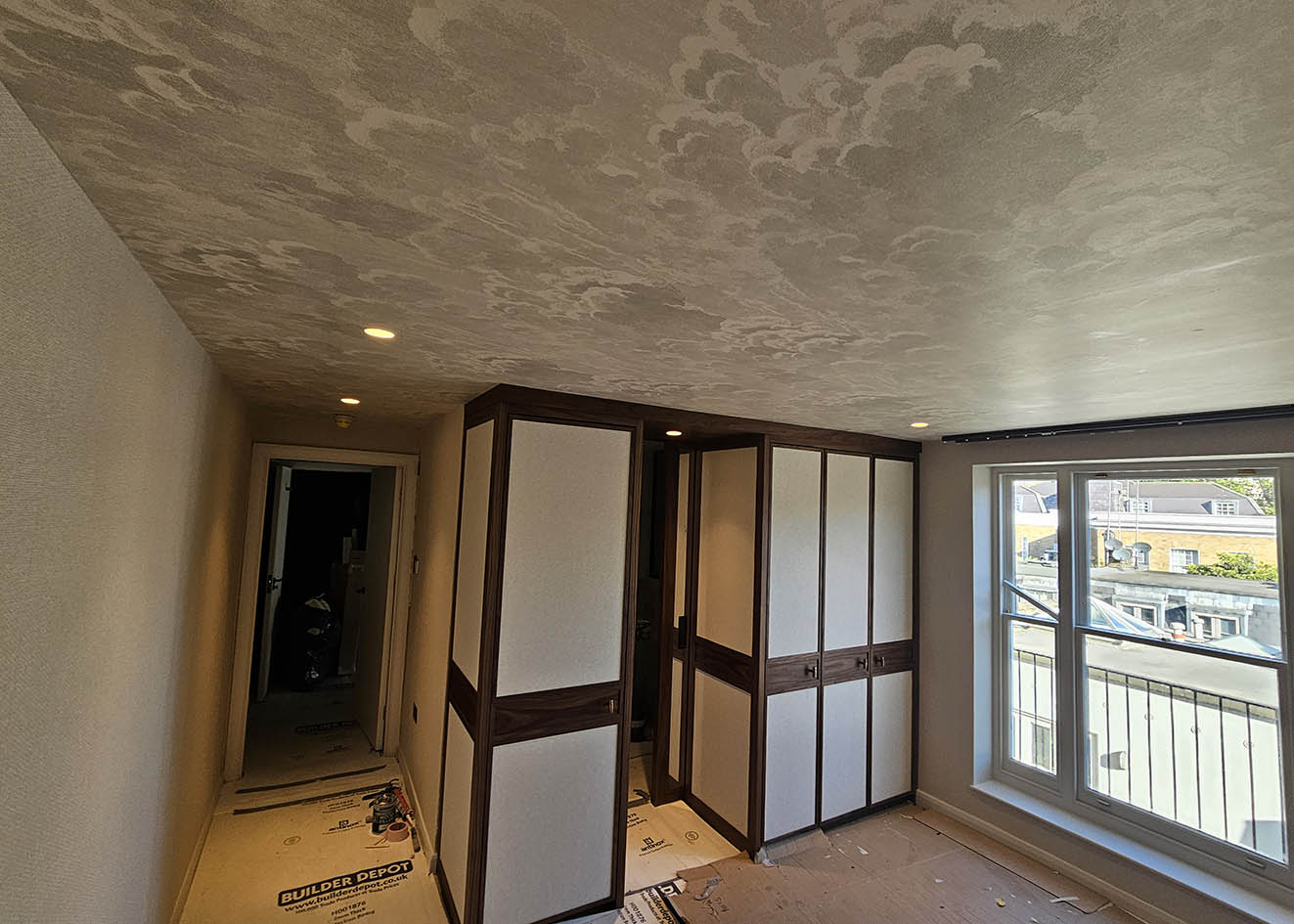 wallpaper-installer-Lancaster-Gate Wallpaper installation in frames and wallpapered ceiling by Bluespec Decorating Limited, London.